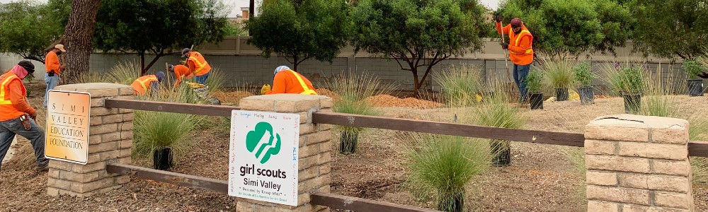 Workers updating Welcome Corner