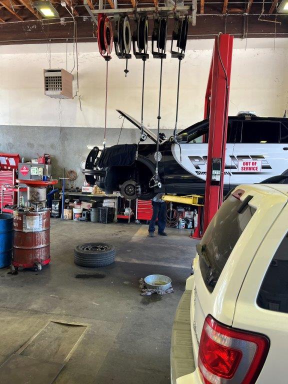 Police vehicle in for repair.